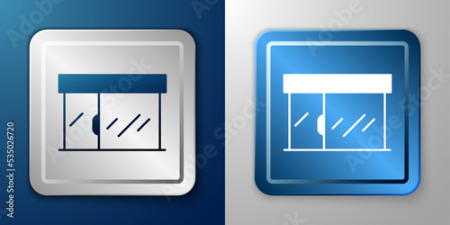 Free Download White Shopping building or market store icon isolated on blue and grey background. Shop construction. Silver and blue square button. Vector - GFXLoad