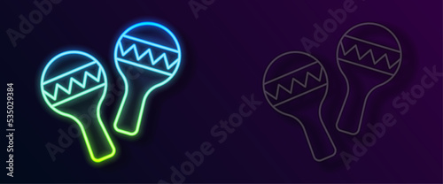 Glowing neon line Maracas icon isolated on black background. Music maracas instrument mexico. Vector