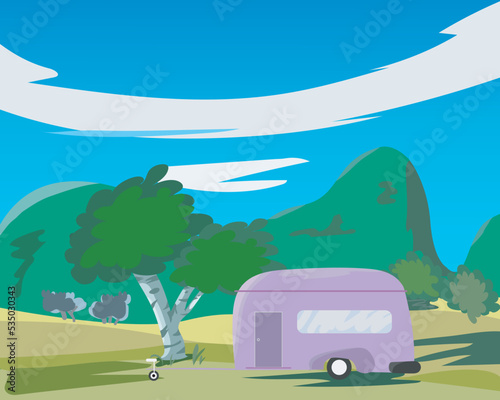The van is parked in a beautiful rain forest park. Camper van travel concept,