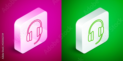 Isometric line Headphones icon isolated on pink and green background. Earphones. Concept for listening to music, service, communication and operator. Silver square button. Vector