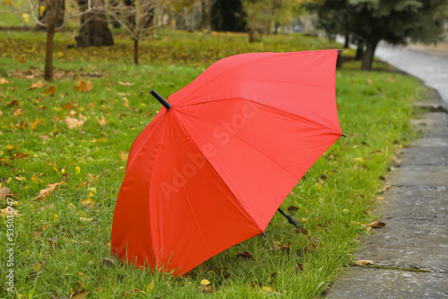 Stylish bright umbrella outdoors © Pixel-Shot