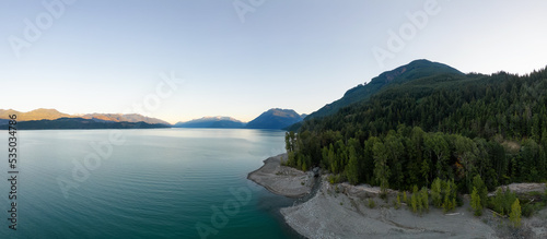 Aerial Panoramic View of Canadian Mountain Landscape over Harrison Lake. Sunny Morning Sunrise. British Columbia, Canada. Nature Background Panorama