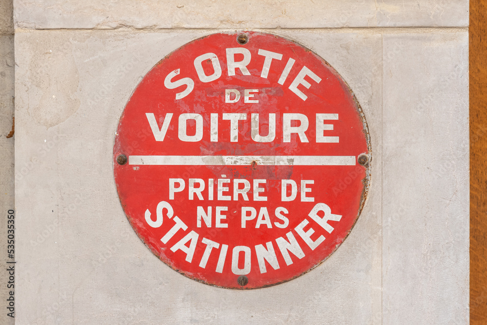 Fototapeta premium vehicles exit sign in Paris, France. To make people aware not to park