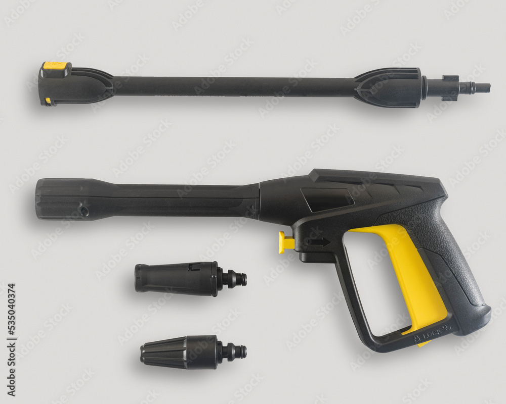 a water gun with various nozzles for a high-pressure car wash. isolated on white. a water gun with various nozzles for a high-pressure car wash. isolated on white.