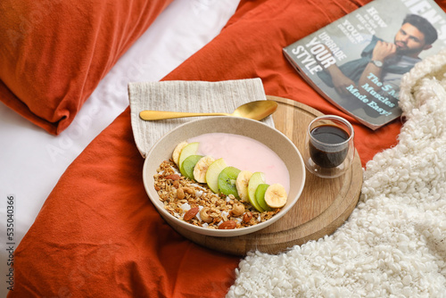 Bowl of tasty granola, yogu...