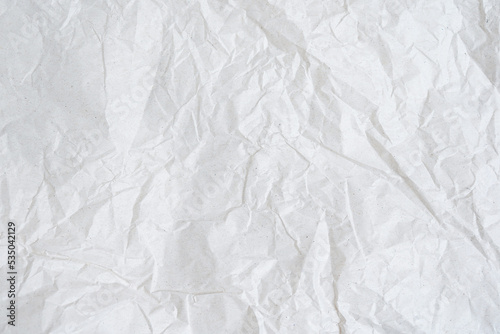 Crumpled white paper texture, place for text