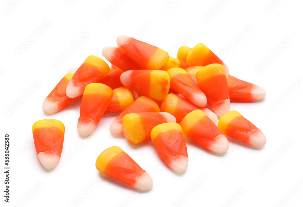 Halloween candy corns on white background