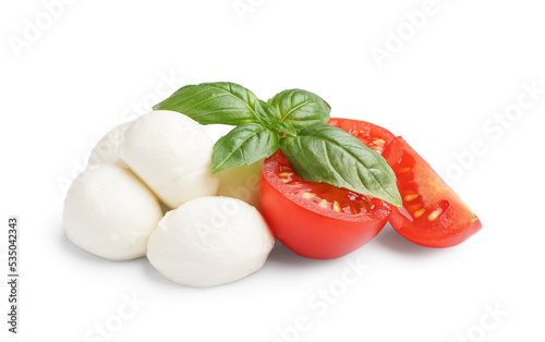 Delicious mozzarella cheese, basil and tomatoes on white background