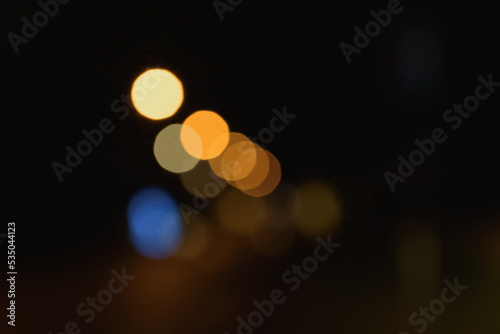 Blurred street lights at night. Copy space.