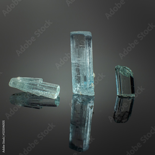 A wonderful item from the mineralogical collection. Beryl mineral crystal on a dark background.