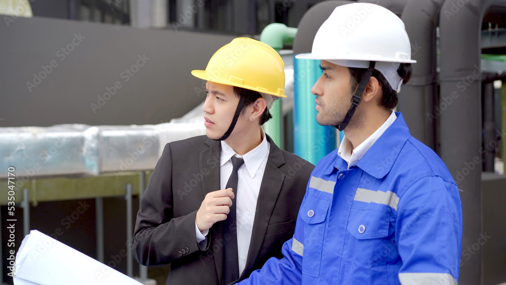 Businessman and construction engineer having a discussion. Businessman and construction engineer having a discussion.