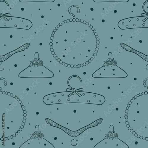 seamless background with clothes hangers