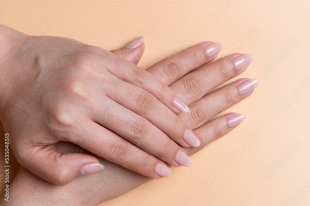 Fototapeta premium Woman hands on top of each other