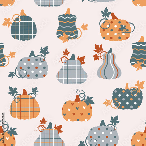 Seamless pattern with patchwork pumpkins with different prints on them. Vector illustration.
