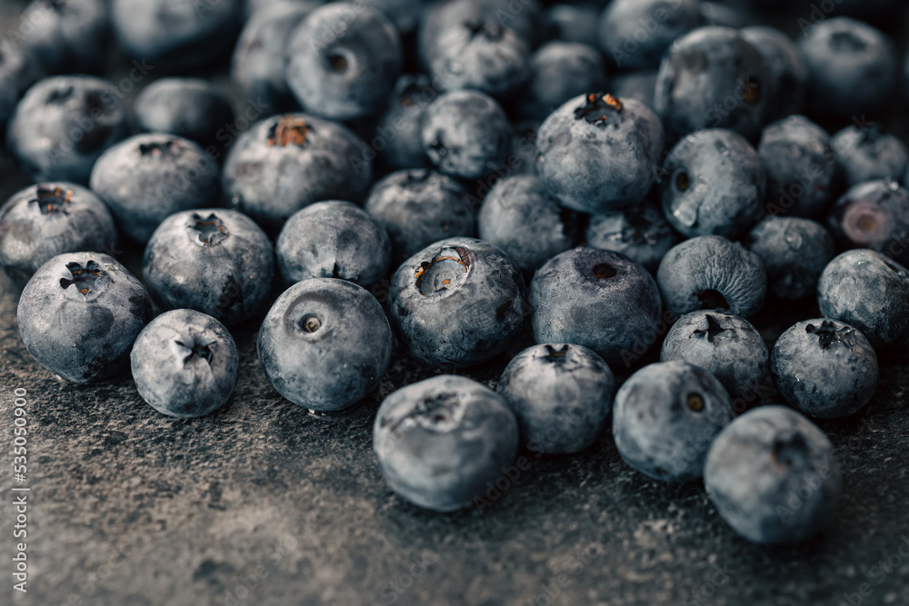 Wet ripe blueberries close up, macro shot. Wet ripe blueberries close up, macro shot.