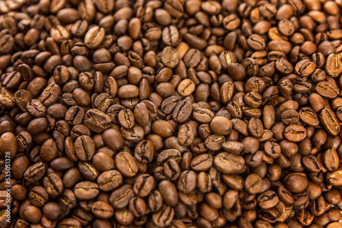 Lots of roasted coffee beans. Background. Space for text. © Анна Демидова