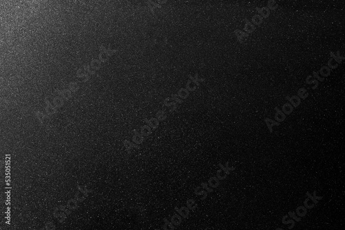 Black metallic textured surface