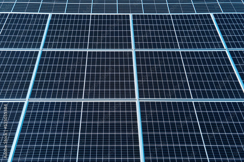 Solar batery in field. Photovoltaic panels for solar energy production. Alternative sustainable energy sources development. Energy crisis in Europe Solar batery in field. Photovoltaic panels for solar energy production. Alternative sustainable energy sources development. Energy crisis in Europe
