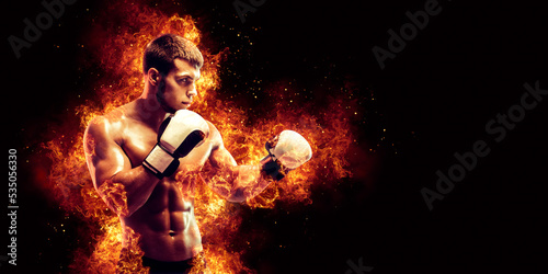 Fighter man punching in fire