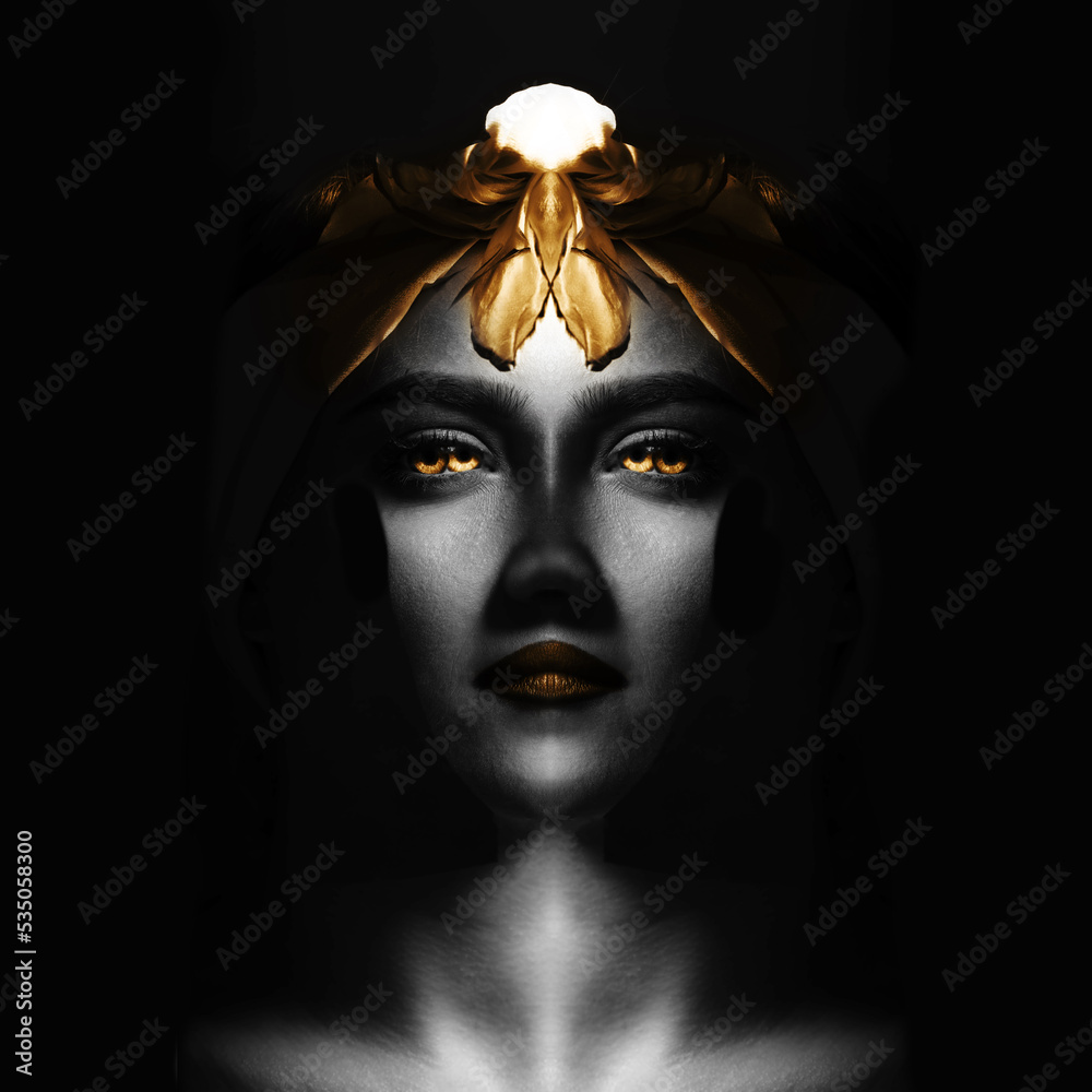 Abstract, fine art, sci-fi concept. Abstract and futuristic looking woman portrait. Alien or extraterrestrial looking model with golden hair, eyes and lips looking calmly at camera Abstract, fine art, sci-fi concept. Abstract and futuristic looking woman portrait. Alien or extraterrestrial looking model with golden hair, eyes and lips looking calmly at camera