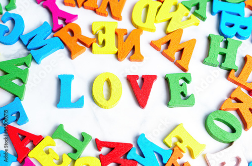 Colorful wooden letters arranged into a LOVE word