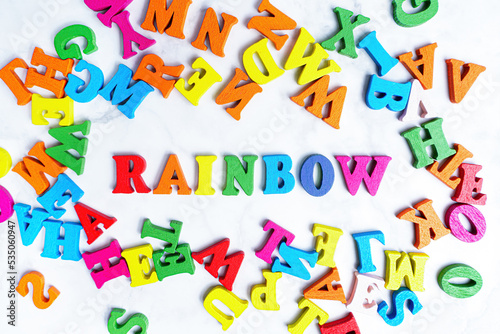 Word RAINBOW made from multicolored characters