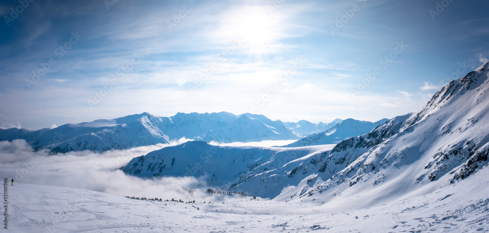 Peaks mountain Pirin covered in snow in Winter sunny day. Bansko, Bulgaria Peaks mountain Pirin covered in snow in Winter sunny day. Bansko, Bulgaria