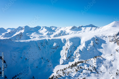 Peaks mountain Pirin covered in snow in Winter sunny day. Bansko  Bulgaria