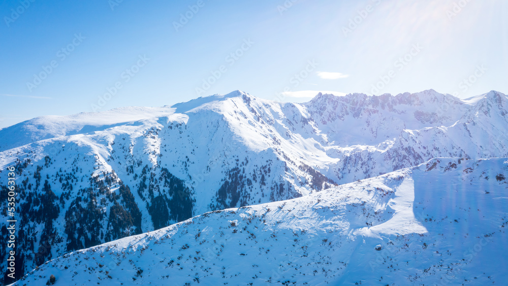 Peaks mountain Pirin covered in snow in Winter sunny day. Bansko, Bulgaria