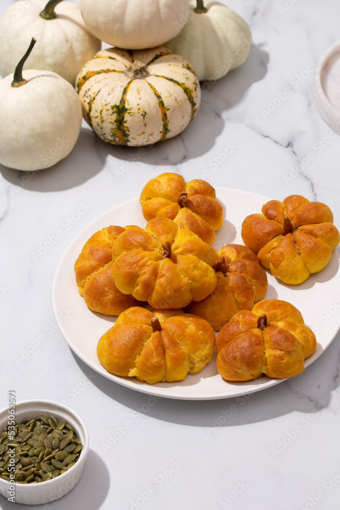 pumpkin buns on white table pumpkin buns on white table