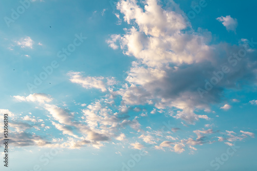 Photo of some white wispy clouds and blue sky cloudscape