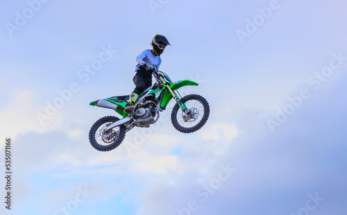 Moto freestyle jump rider on a motorcycle