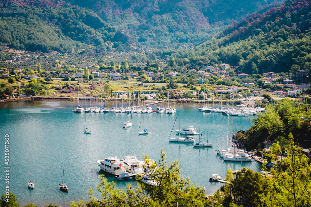 Yacht club about Orhaniye village and Kizkumu beach, on Bozburun peninsula near Marmaris resort town in Turkey.