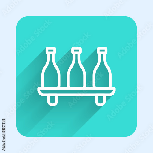 White line Bottle of wine icon isolated with long shadow background. Wine varieties. Green square button. Vector