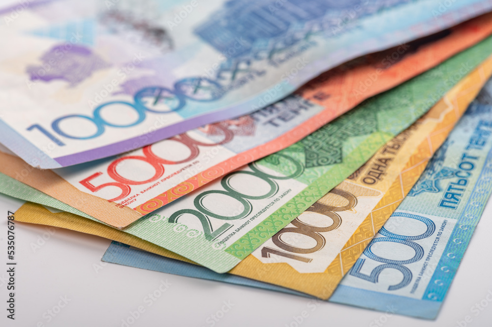 Obraz premium Kazakhstan money - tenge. 500, 1000, 2000, 5000, 10000 banknotes. Close up of tenge on white background.