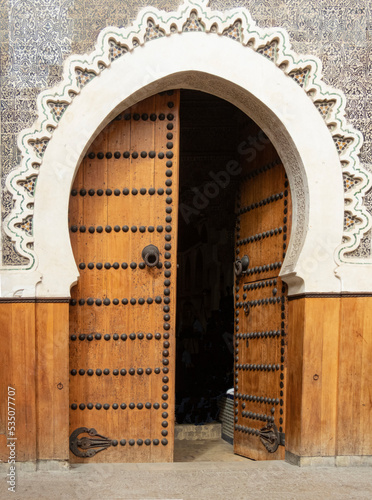 Unique arabic style doorway with wooden doors