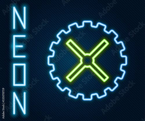 Glowing neon line Bicycle sprocket crank icon isolated on black background. Colorful outline concept. Vector