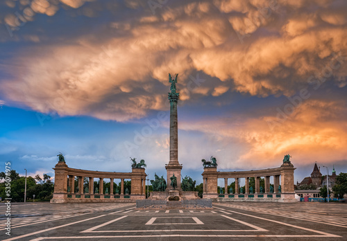 Budapest, Hungary - Unique mammatus clouds over Heroes' Square Millennium Monument at Budapest after a heavy thunderstorm on a summer afternoon sunset photo