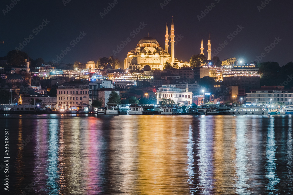 Istabul, Turkey - July 01,2017 : night view to Eminonu Harbor and New Mosque