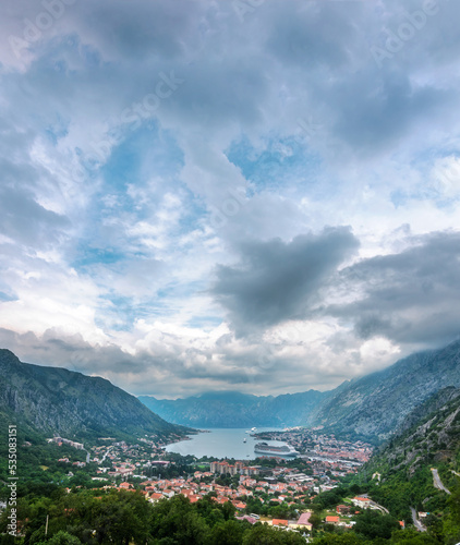 Kotor bay, beautiful touristic attraction point with clouds sun light and morning mist at background