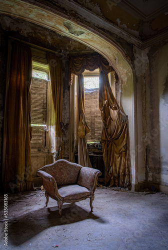 Decay living room in an abandoned liberty mansion in Northern Italy