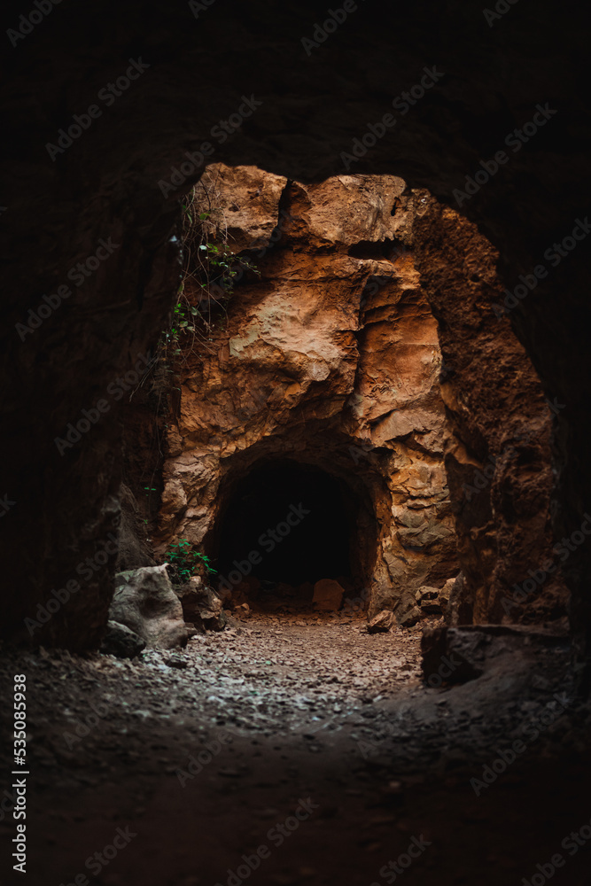 Shot of the entrance of a mine cave at Cerro del Hierro (San Nicolás del Puerto, Spain)