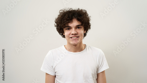 Portrait of smiling teenage boy looking at camera