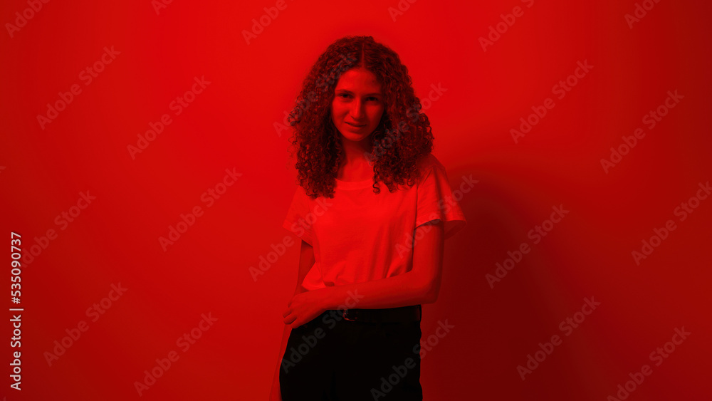 Front of serious female teenage looking at camera