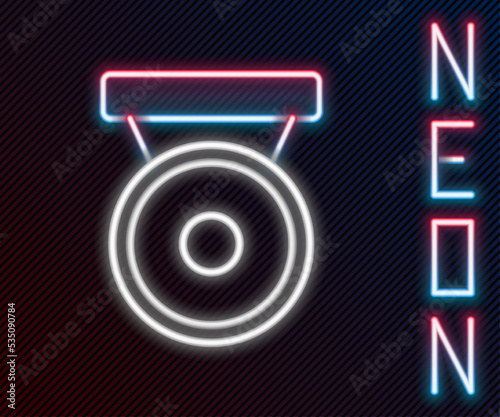 Glowing neon line Boxing gong icon isolated on black background. Boxing bell. Colorful outline concept. Vector