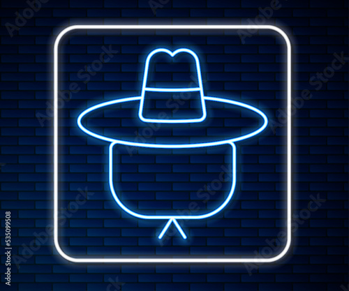 Glowing neon line Camping hat icon isolated on brick wall background. Beach hat panama. Explorer travelers hat for hunting, hiking, tourism. Vector