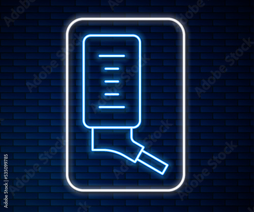 Glowing neon line Automatic drinker for small pets icon isolated on brick wall background. Vector