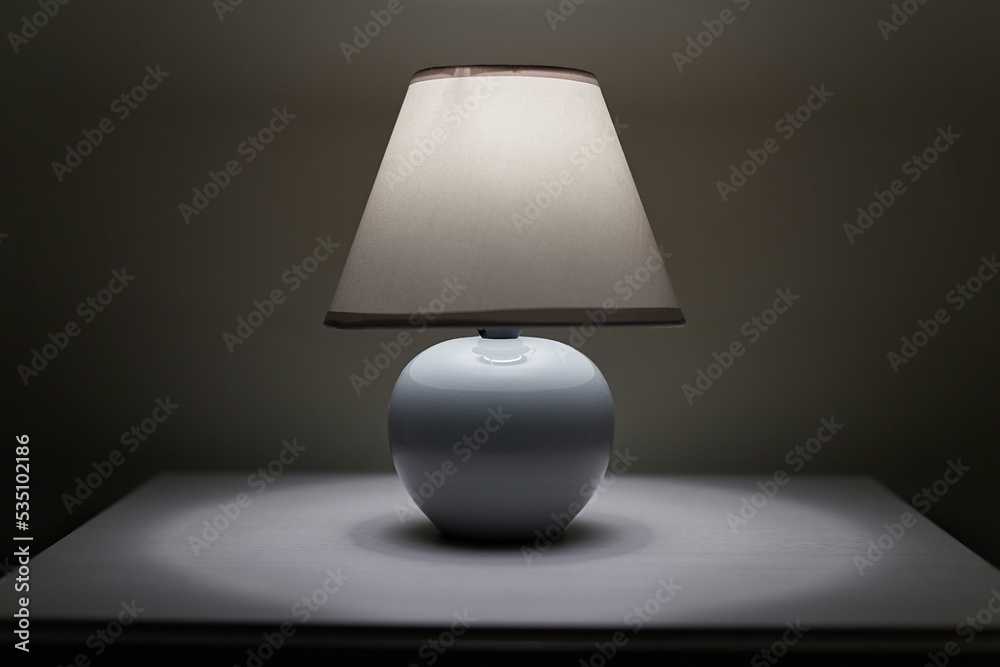 Lamp on a nightstand Lamp on a nightstand