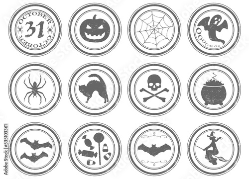 A set of 12 unique grunge stamps, Halloween themed. Each stamp is isolated, grouped, labeled, and on an individual layer.  © MLWilson