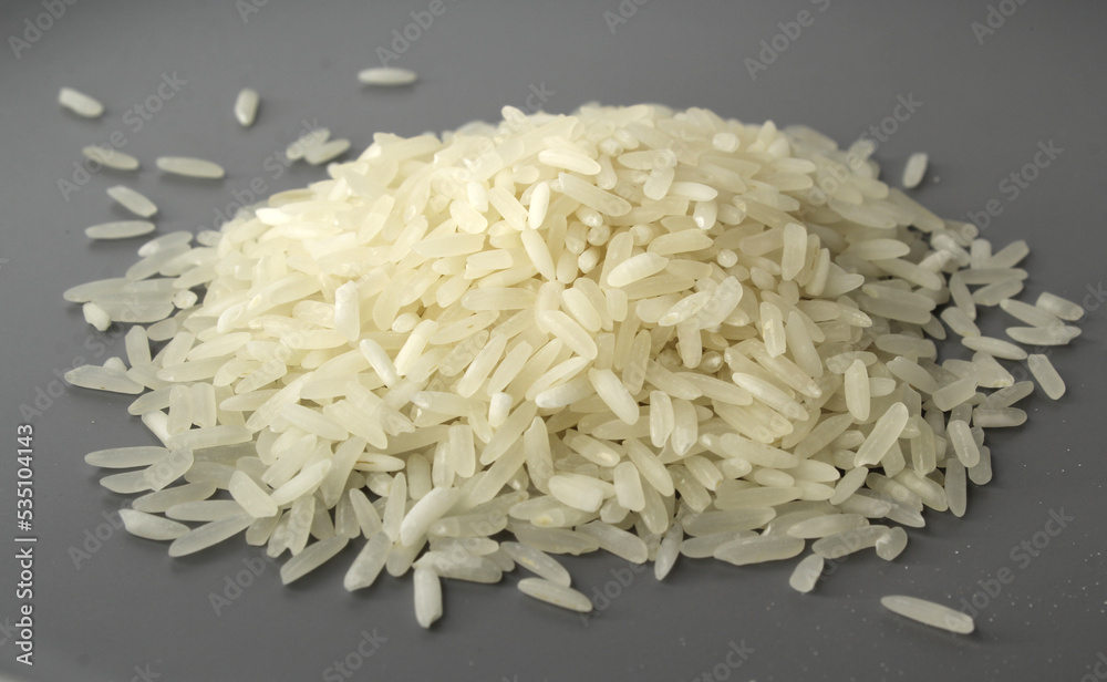 White rice on a grey background